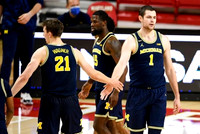 Franz Wagner (21), Chaundee Brown Jr. (15), and Hunter Dickinson (1)