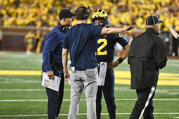 Jim Harbaugh, and Cade McNamara (12)