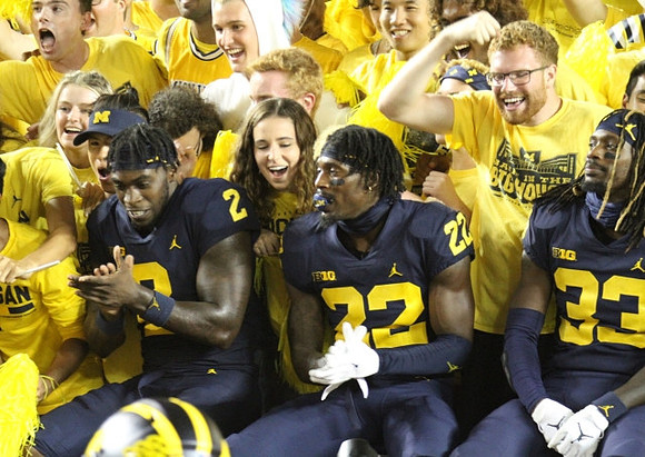 Brad Hawkins (2), Gemon Green (22), and German Green (33)