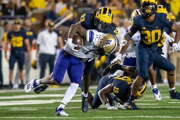 German Green (33), Rod Moore (19), and Daxton Hill (30)