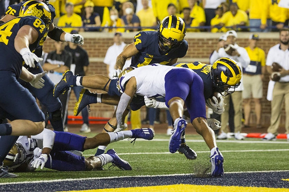 Ryan Hayes (76), Joel Honigford (84), Roman Wilson (14), and Blake Corum (2)