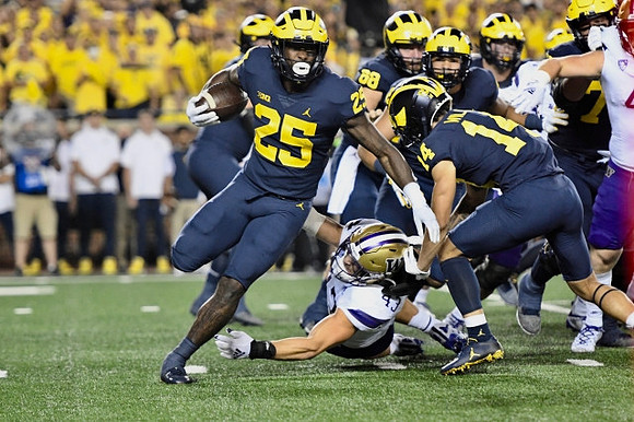 Hassan Haskins (25), Andrew Vastardis (68), and Roman Wilson (14)