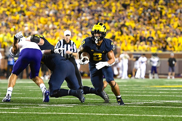 Ryan Hayes (76), and Blake Corum (2)