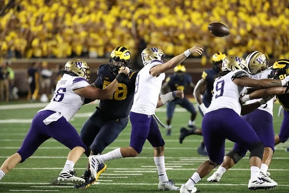 Mazi Smith (58), Josh Ross (12), and Taylor Upshaw (91)