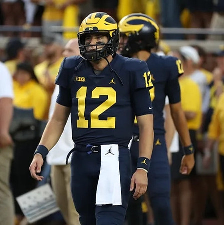 Cade McNamara (12), and Peyton Smith (17)