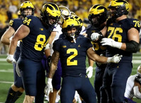 Luke Schoonmaker (86), Joel Honigford (84), Blake Corum (2), and Ryan Hayes (76)