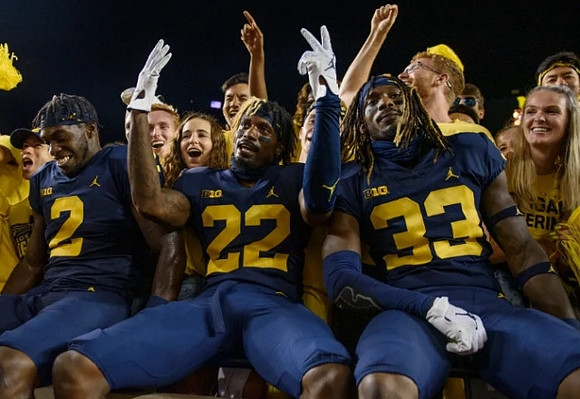 Brad Hawkins (2), Gemon Green (22), and German Green (33)