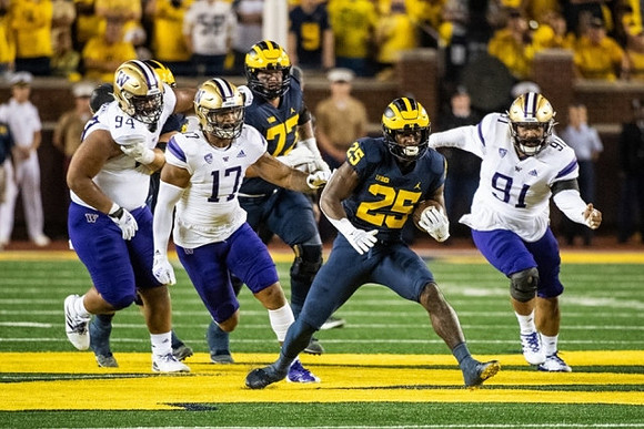 Trevor Keegan (77), and Hassan Haskins (25)
