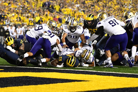 Trevor Keegan (77), Hassan Haskins (25), and Andrew Vastardis (68)