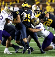 Roman Wilson (14), Hassan Haskins (25), and Andrew Vastardis (68)