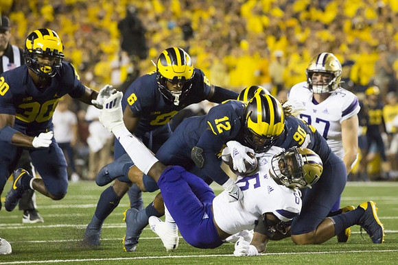Daxton Hill (30), R.J. Moten (6), Josh Ross (12), and Mike Morris (90)