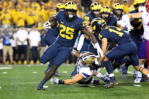 Hassan Haskins (25), Andrew Vastardis (68), and Roman Wilson (14)