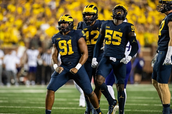 Taylor Upshaw (91), Josh Ross (12), David Ojabo (55), and Aidan Hutchinson (97)