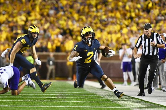 Luke Schoonmaker (86), and Blake Corum (2)