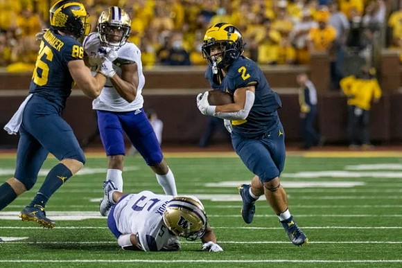Luke Schoonmaker (86), and Blake Corum (2)