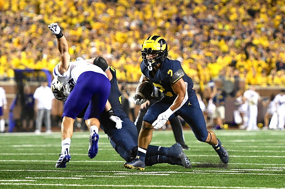 Ryan Hayes (76), and Blake Corum (2)
