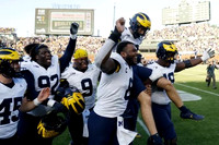 Dominic Zvada (96) and Michigan Team