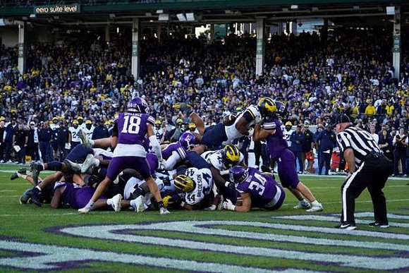 Jordan Marshall (23), Max Bredeson (44), and Jalen Hoffman (42)