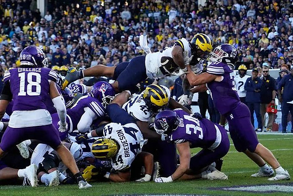 Max Bredeson (44), Jalen Hoffman (42), and Jordan Marshall (23)
