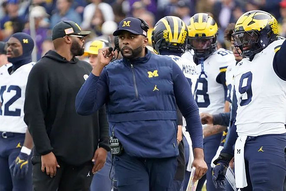 Sherrone Moore and Michigan Team