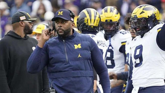 Sherrone Moore and Michigan Team