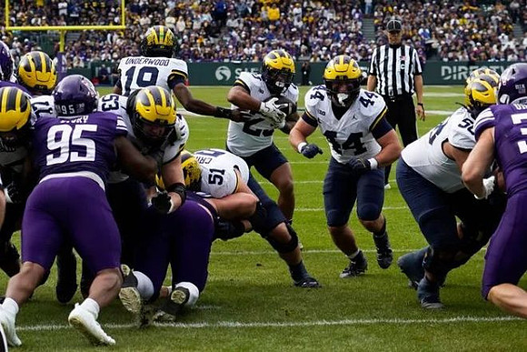 Blake Frazier (77), Jake Guarnera (53), Bryce Underwood (19), Greg Crippen (51), Jordan Marshall (23), Max Bredeson (44), and Giovanni El-Hadi (58)