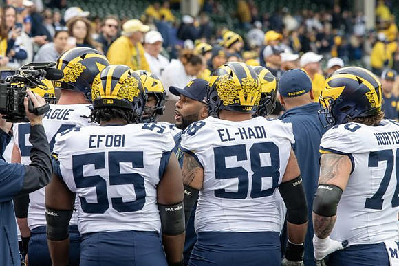Sherrone Moore and Michigan Team