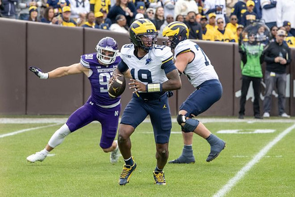 Bryce Underwood (19) and Blake Frazier (77)