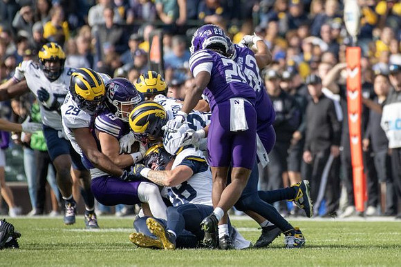 Chibi Anwunah (97), Chase Taylor (29), Elijah Dotson (22), and Deakon Tonielli (88)