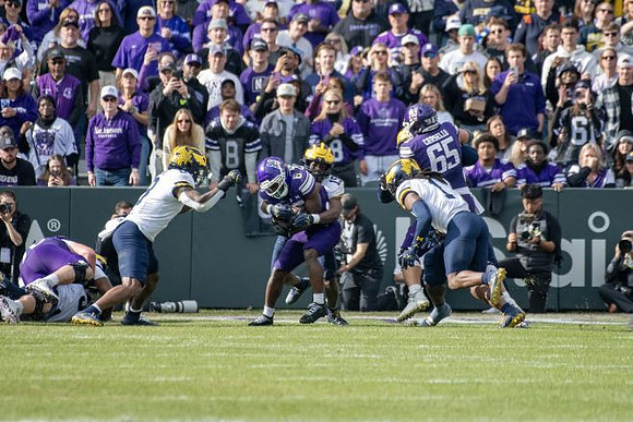 Derrick Moore (8), Ernest Hausmann (15), and Jaishawn Barham (1)