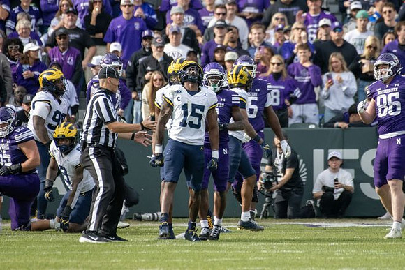 Trey Pierce (95), Derrick Moore (8), and Ernest Hausmann (15)