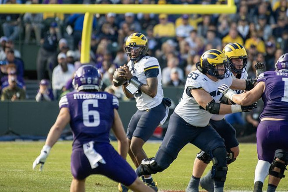 Bryce Underwood (19) and Jake Guarnera (53)