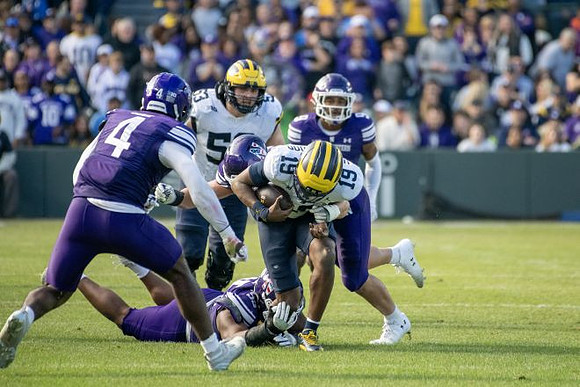 Bryce Underwood (19) and Jake Guarnera (53)