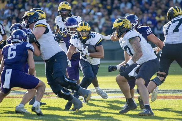 Bryce Underwood (19), Bryson Kuzdzal (24), Marlin Klein (17), and Blake Frazier (77)