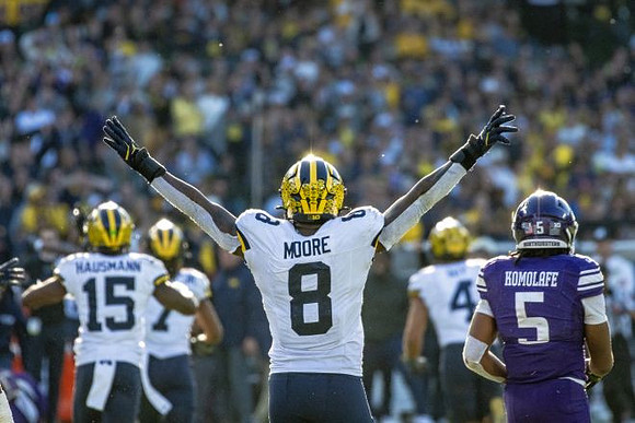 Ernest Hausmann (15), TJ Metcalf (7), and Derrick Moore (8)
