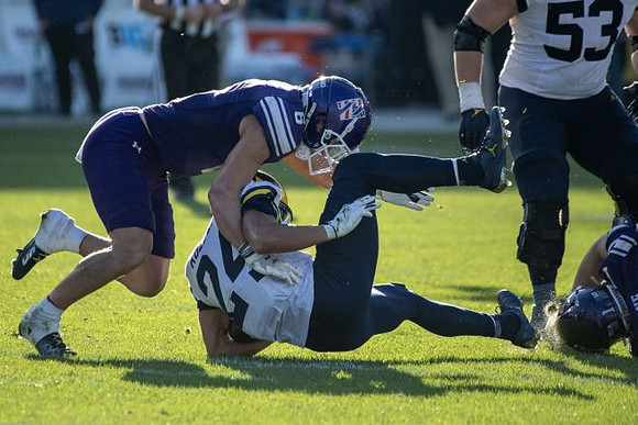 Bryson Kuzdzal (24) and Jake Guarnera (53)