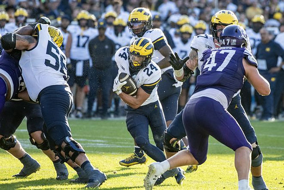 Giovanni El-Hadi (58), Bryson Kuzdzal (24), Bryce Underwood (19), and Blake Frazier (77)