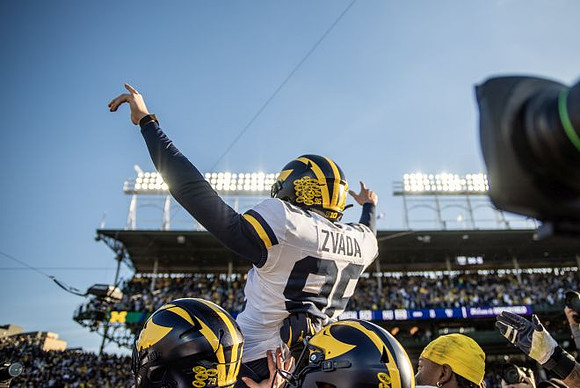 Dominic Zvada (96) and Michigan Team