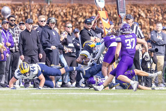 Max Bredeson (44), Andrew Marsh (4), and Northwestern Head Coach David Braun
