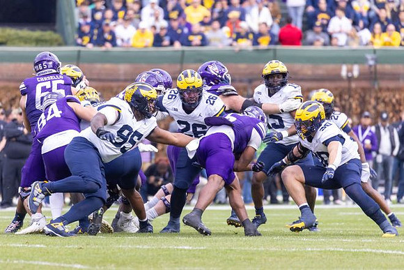 Trey Pierce (95), Rayshaun Benny (26), Ernest Hausmann (15), Jimmy Rolder (30), and Jyaire Hill (20)