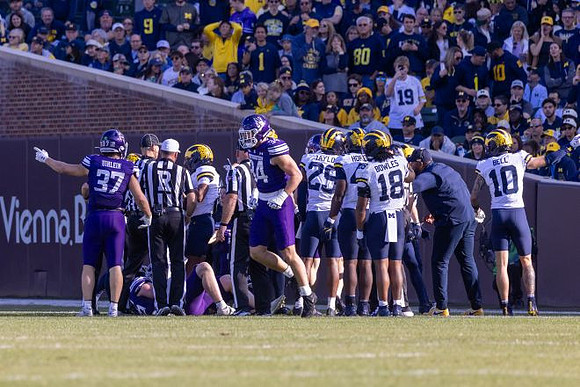 Chase Taylor (29), Jalen Hoffman (42), Troy Bowles (18), and Kendrick Bell (10)