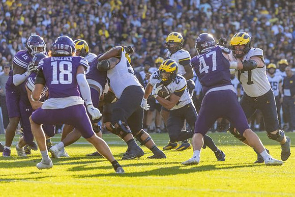 Bryson Kuzdzal (24), Bryce Underwood (19), and Blake Frazier (77)