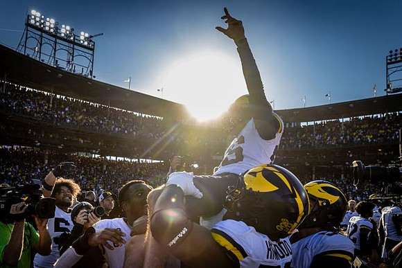 Dominic Zvada (96) and Michigan Team