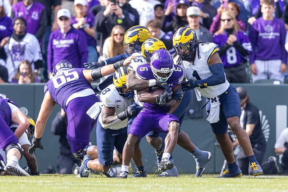 Derrick Moore (8), Ernest Hausmann (15), and Jaishawn Barham (1)
