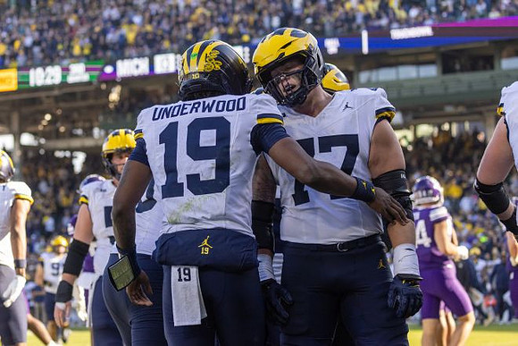 Bryce Underwood (19) and Blake Frazier (77)