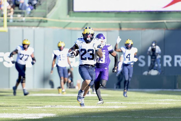 Blake Frazier (77), Jordan Marshall (23), and Andrew Marsh (4)