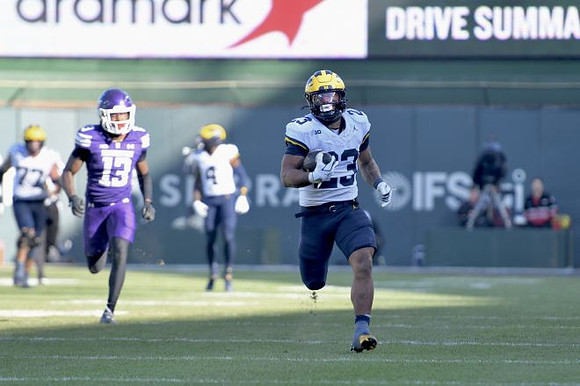 Blake Frazier (77), Andrew Marsh (4), and Jordan Marshall (23)