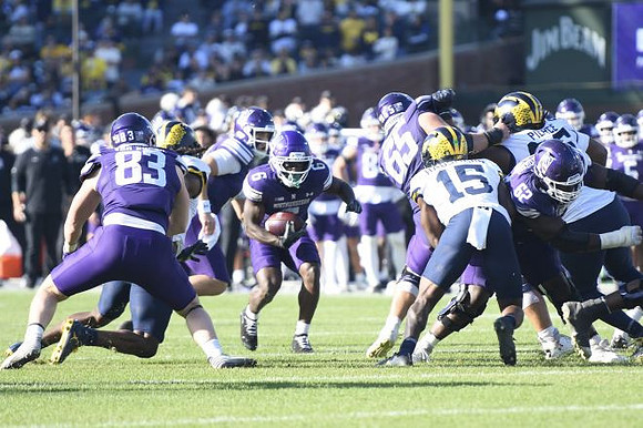 Ernest Hausmann (15) and Trey Pierce (95)