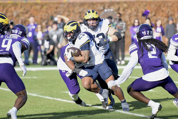 Jordan Marshall (23) and Jake Guarnera (53)