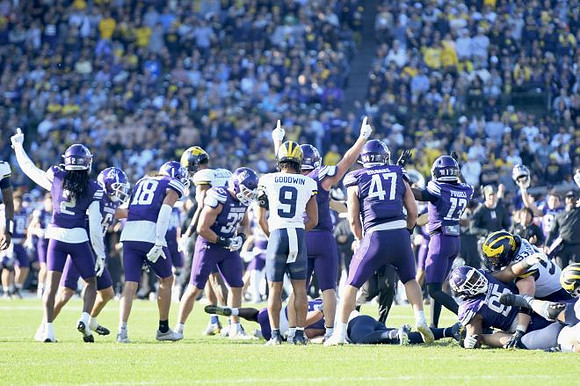 Channing Goodwin (9) and Jake Guarnera (53)